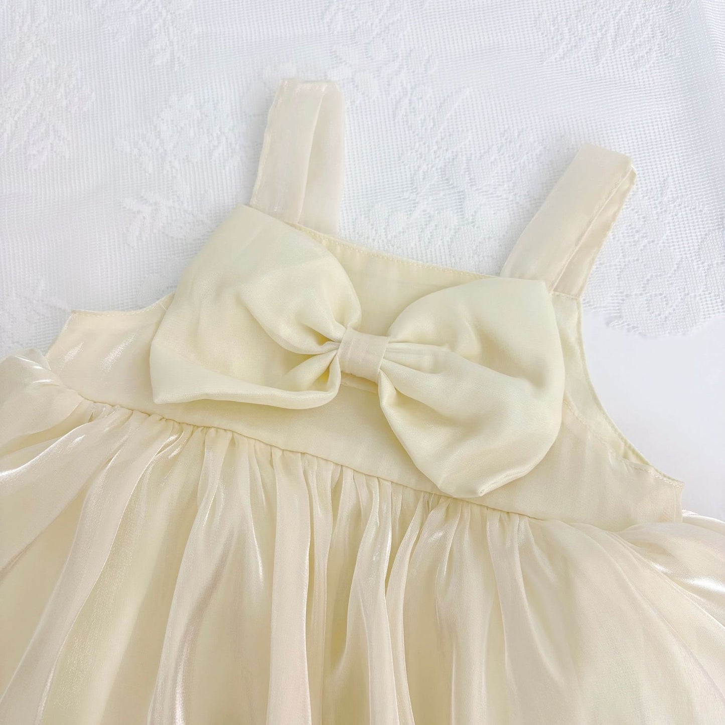 Gloss bow romper dress