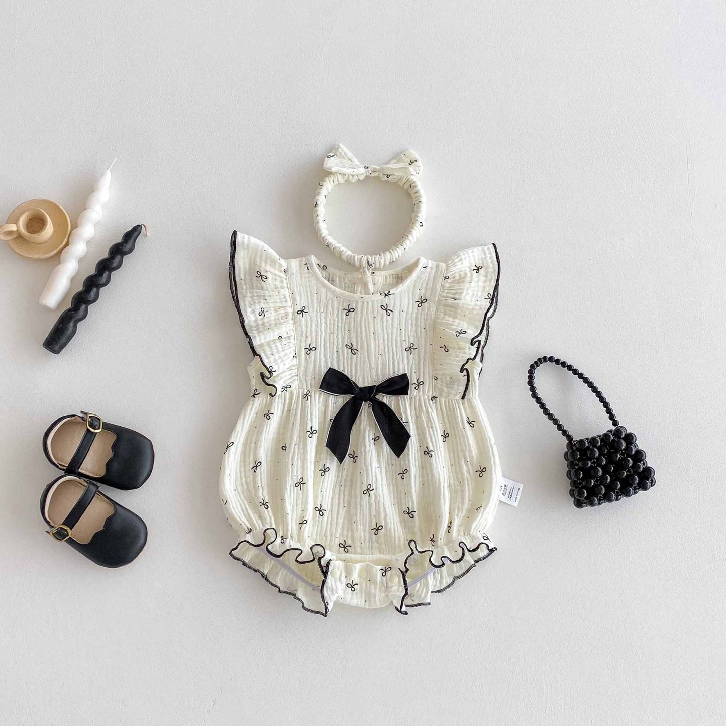 Tiny bow romper