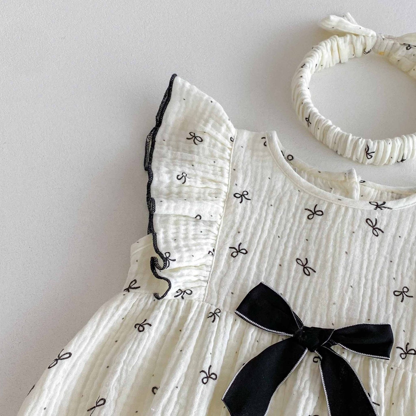 Tiny bow romper
