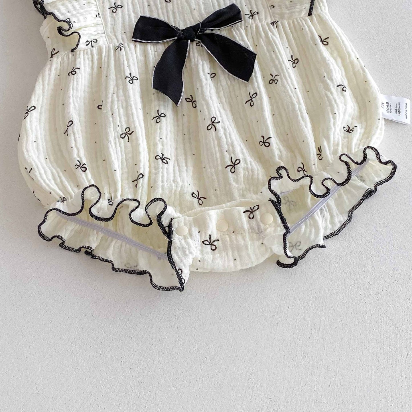 Tiny bow romper