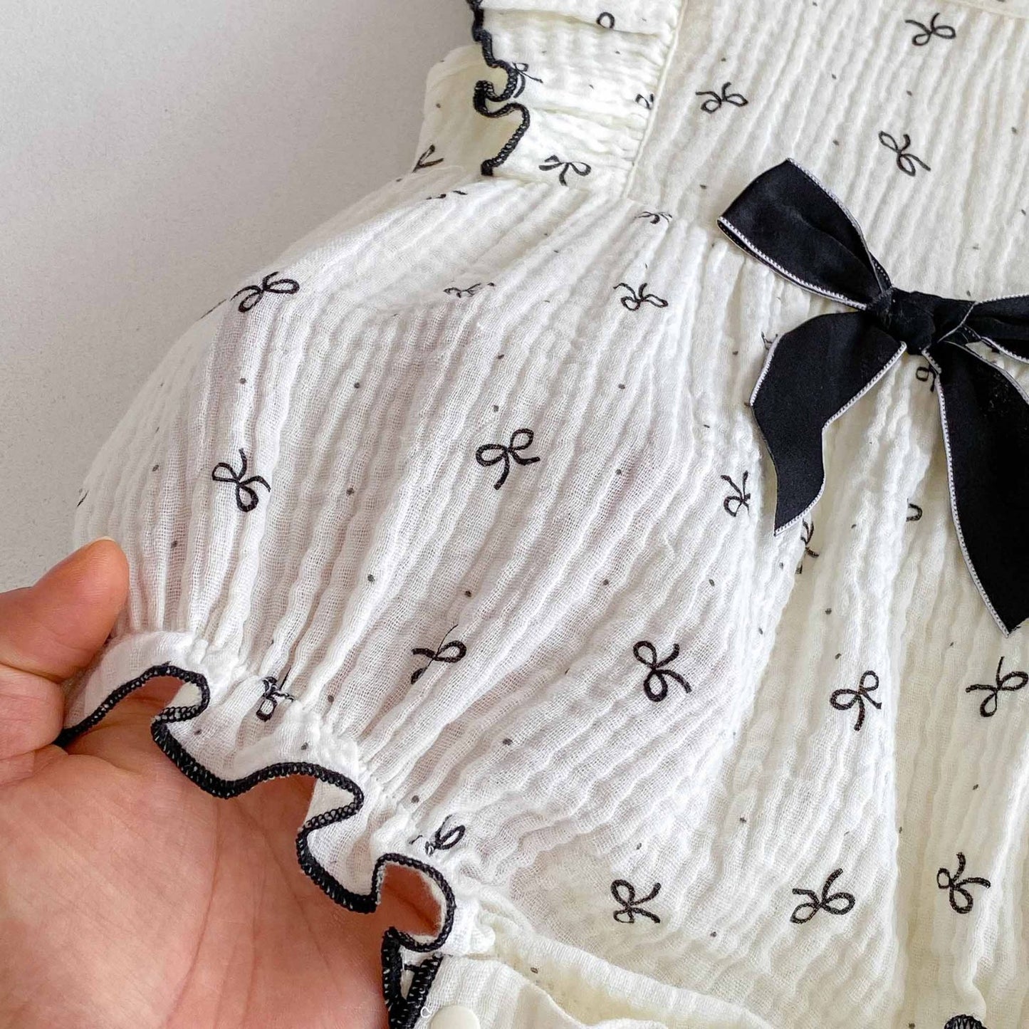 Tiny bow romper