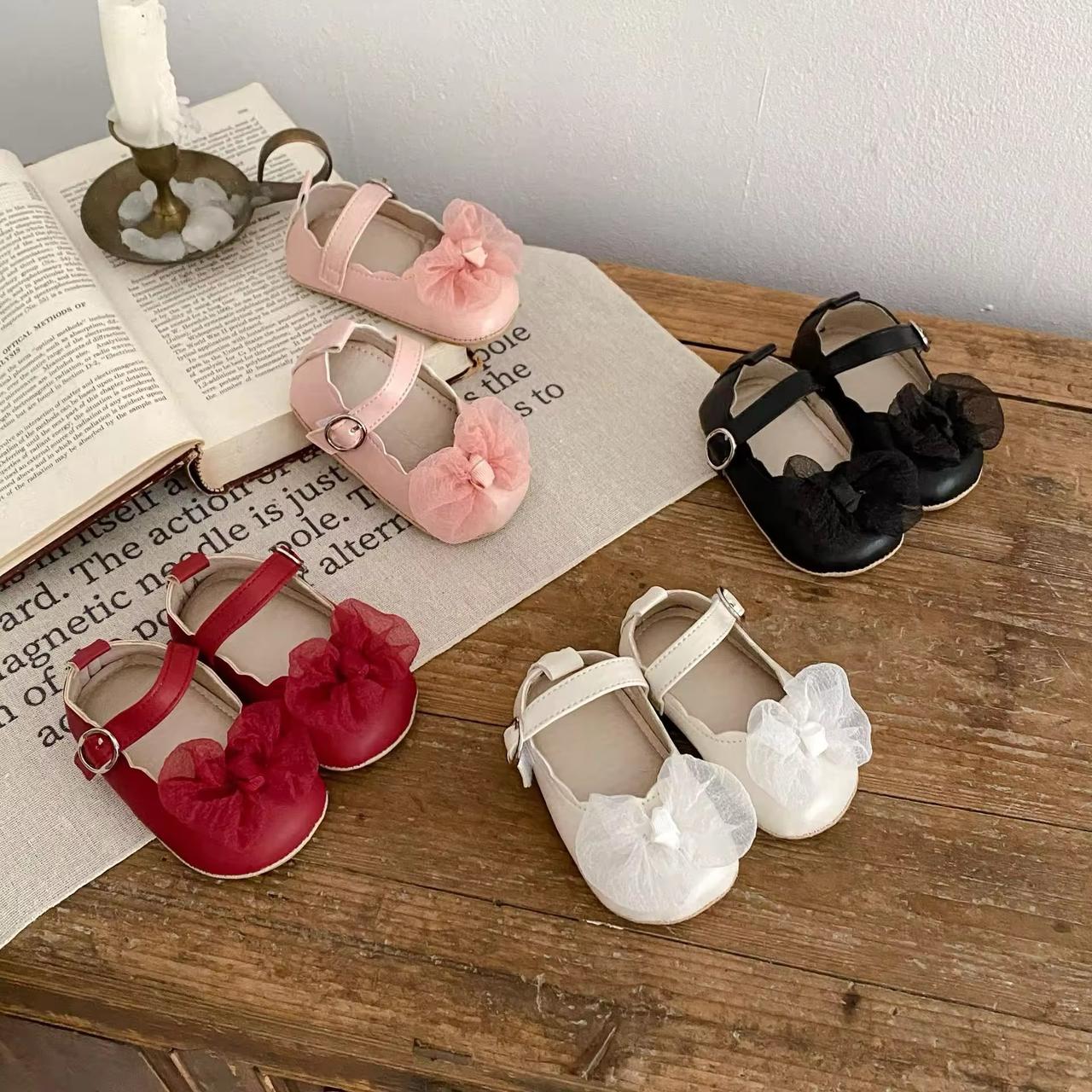 Scallop bow shoes