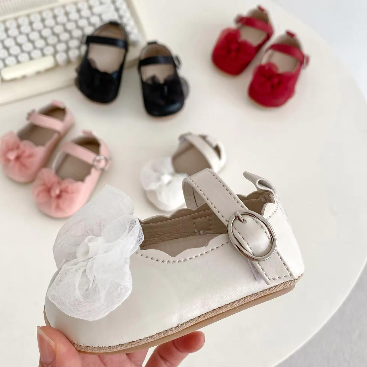 Scallop bow shoes