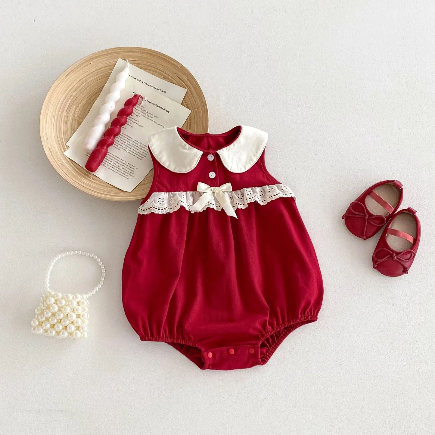 Arini bow romper