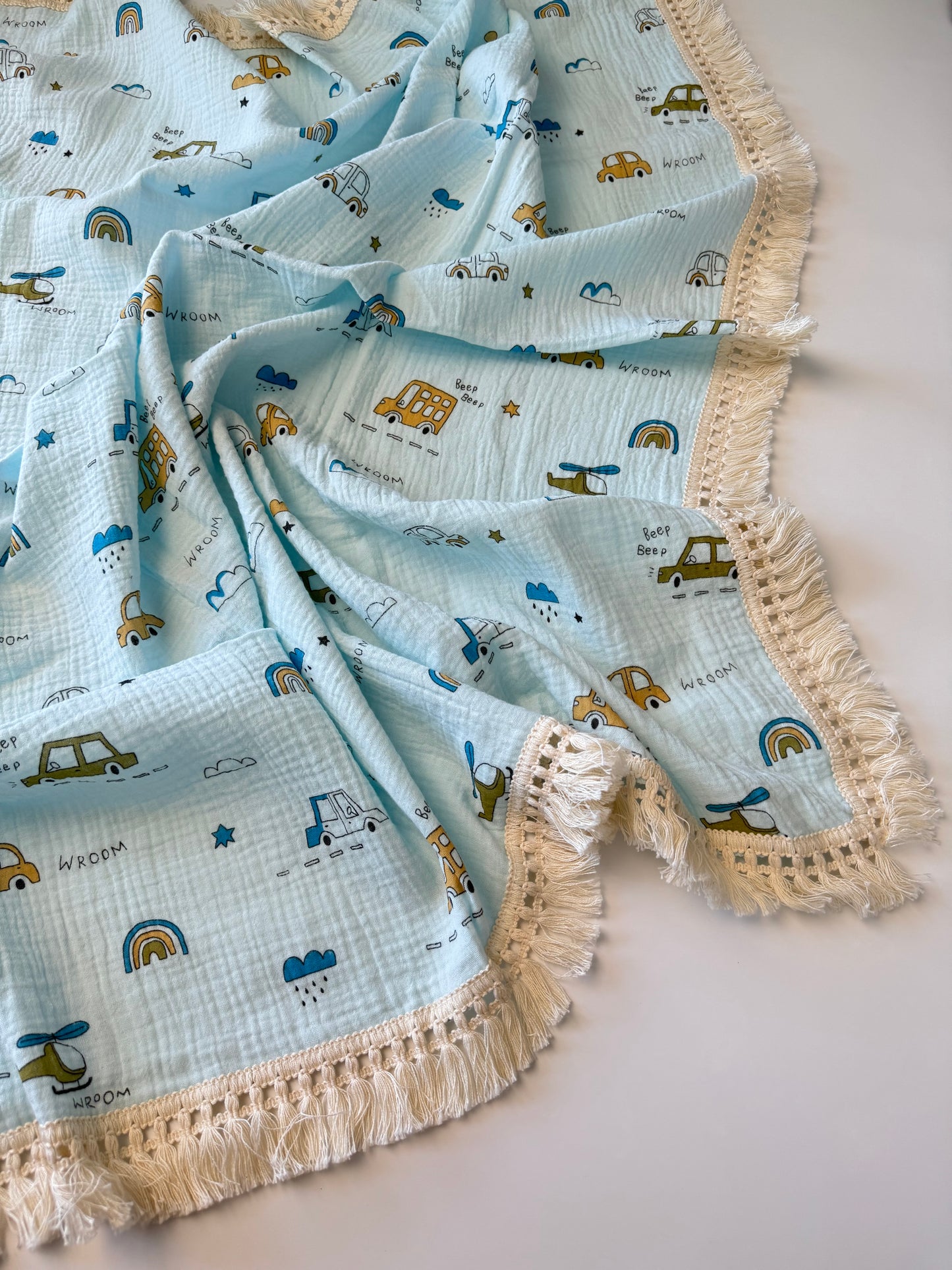 Baby tassel blanket