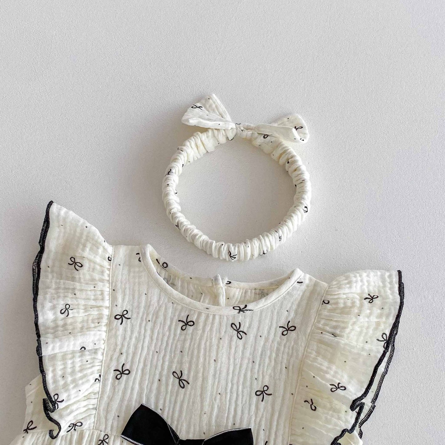 Tiny bow romper