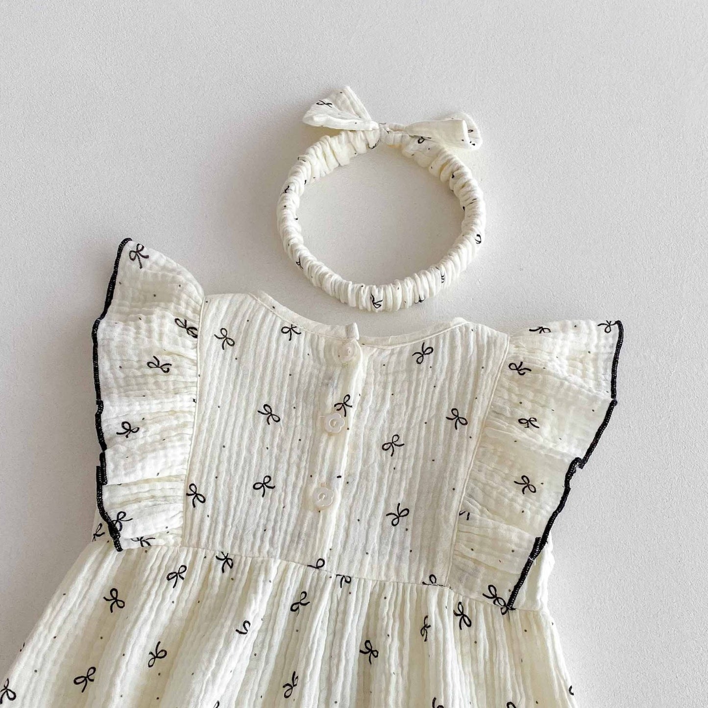 Tiny bow romper