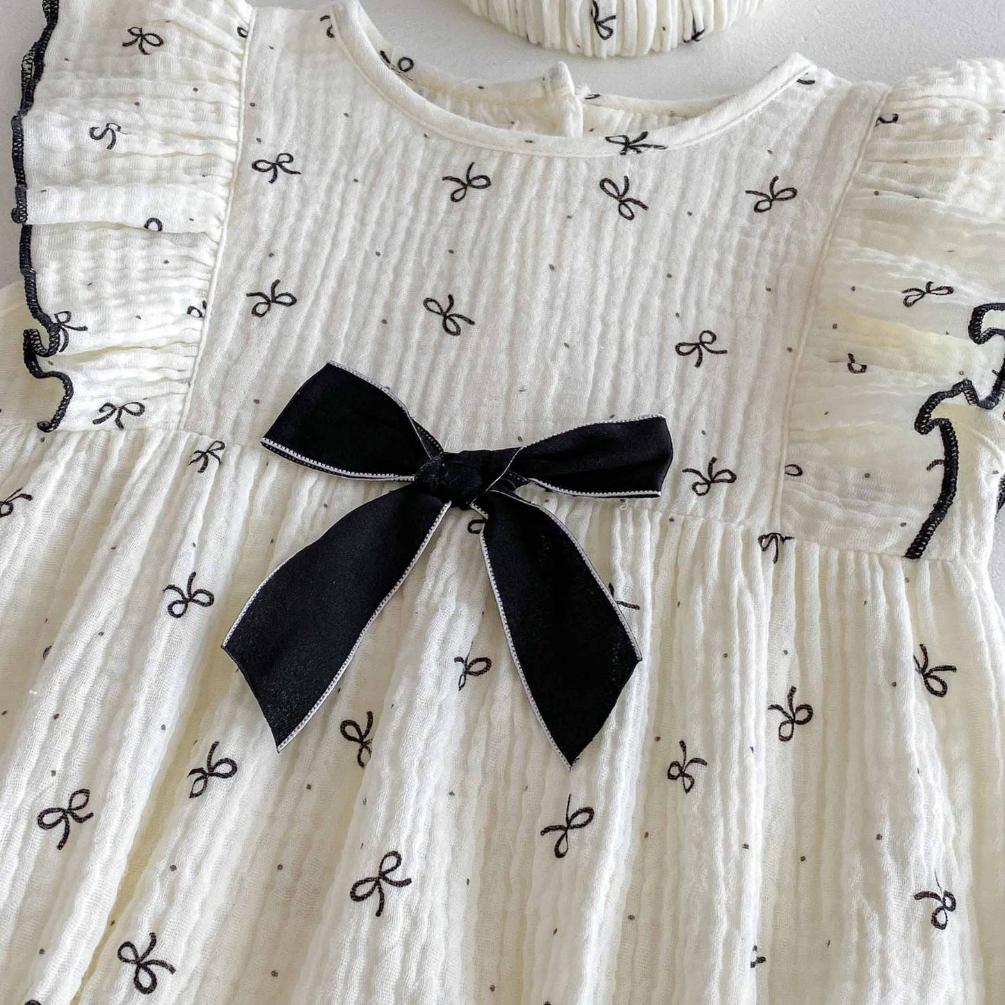 Tiny bow romper